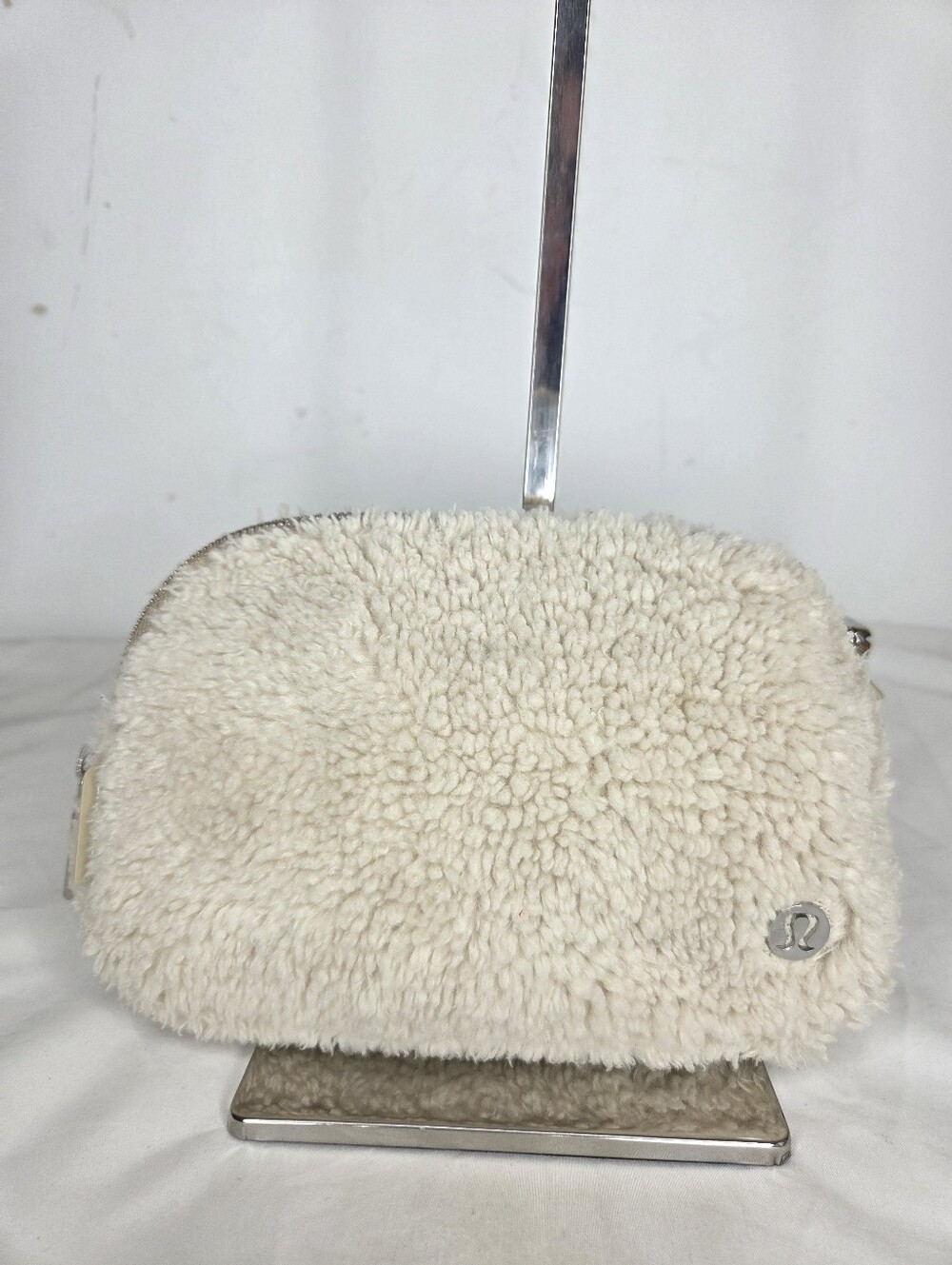 Lululemon Faux Shearling Belt Bag in Cream